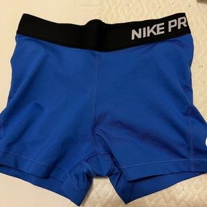 Blue Nike pro shorts